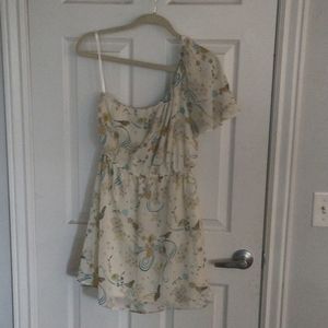 One shouldered mini dress with birds and flowers. Light chiffon fabric.